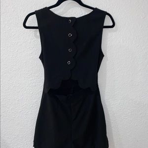 Black short romper.